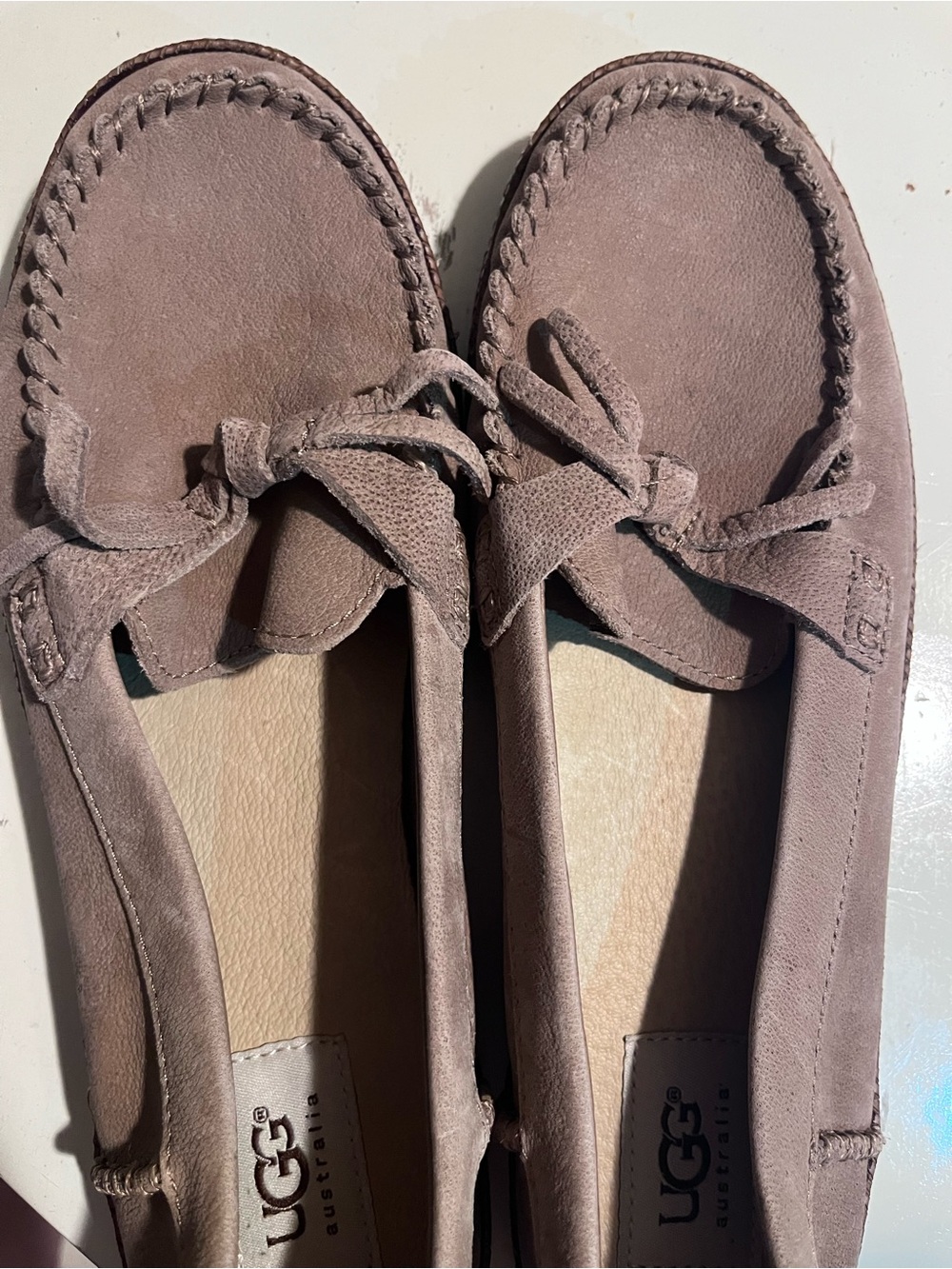 UGG Women's Taupe Suede Moccasin Slippers with Bow Detail, never worn
